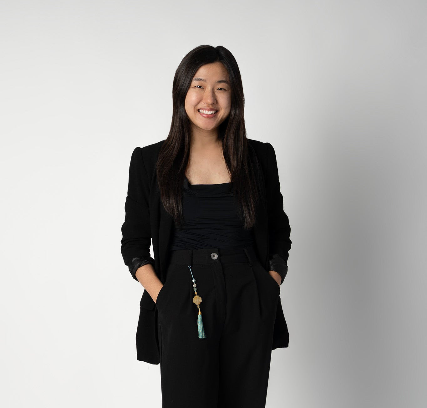 Founder of Amalier in a black outfit with a green norigae